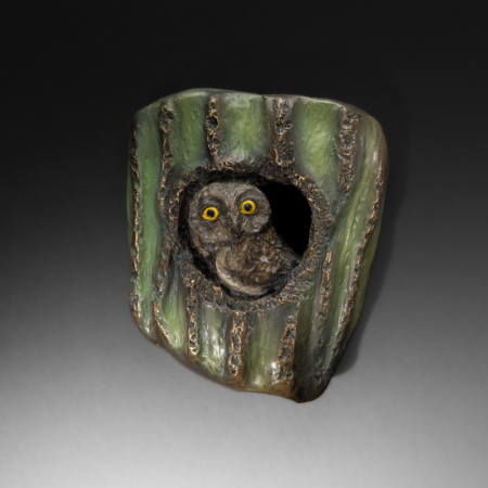 Photo of wall mount bronze sculpture of Elf Owl in a cactus