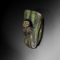 Photo of wall mount bronze sculpture of Elf Owl in a cactus